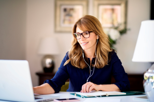 Woman at desk mastering proposal writing